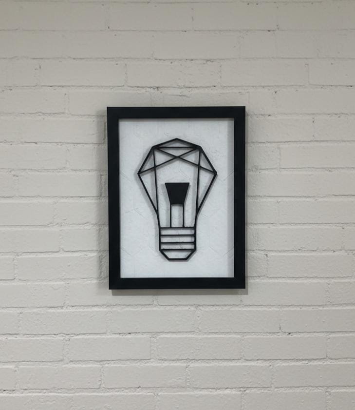 Geometric Light Bulb Wall Art, 3D Layered PLA Decor, Minimalist Industrial Style